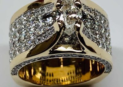 Luxury diamond ring with intricate design and gold band for special occasions.