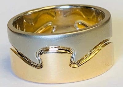 Elegant gold and silver ring, perfect for jewelry repairs and custom designs.