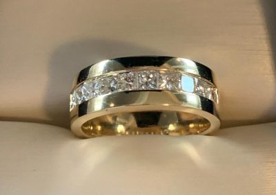 Gold ring with diamonds, perfect for jewelry repairs or custom designs in Kelowna.